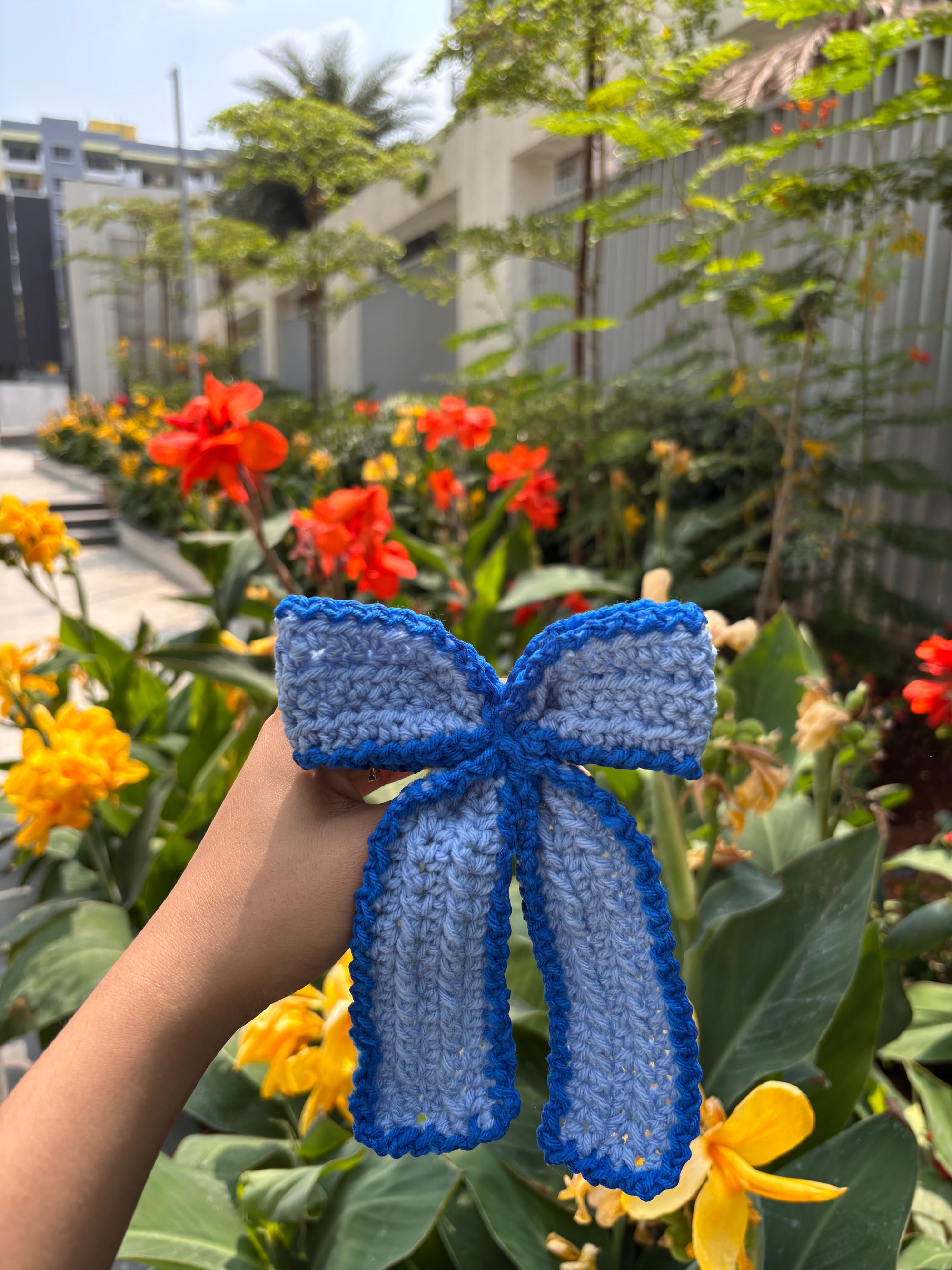 Blue crochet bow 
