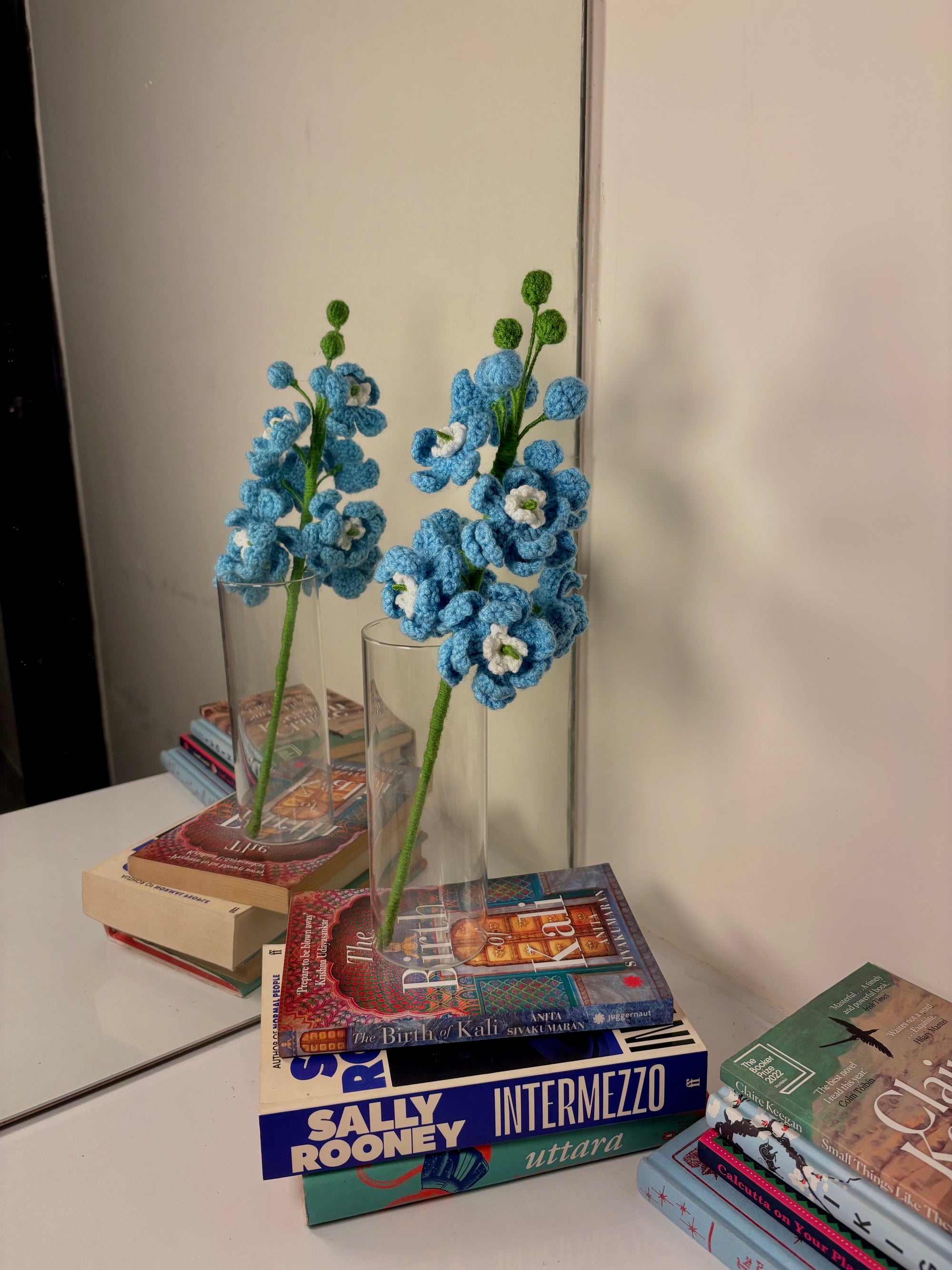 Blue crocheted delphinium flower stem