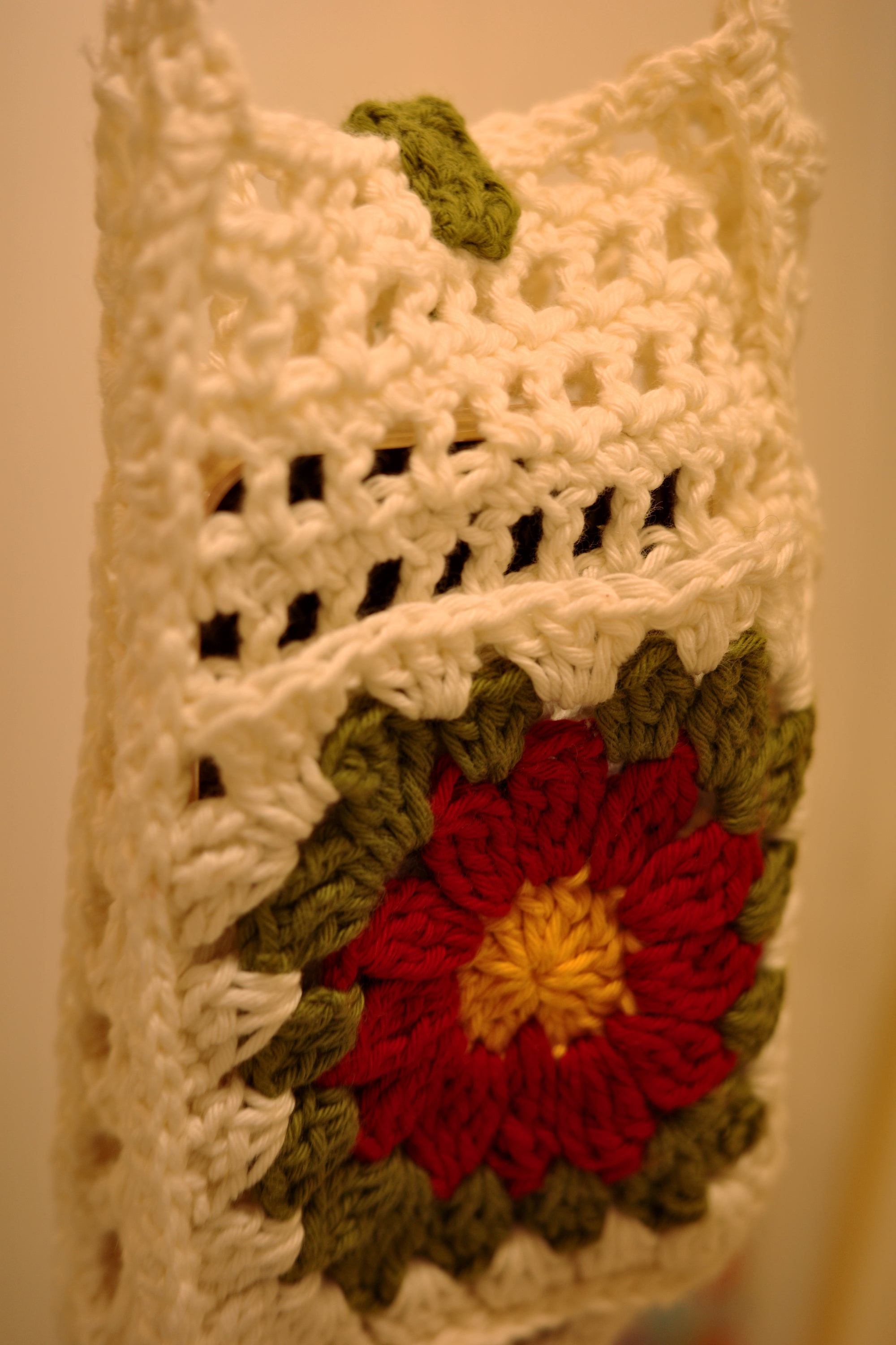 white crochet phone pouch with red flower flap